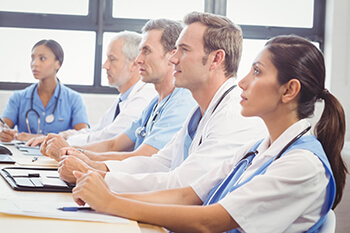 Doctor Students Listening to a Lecture