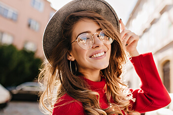 Woman Smiling and Wearing Glasses